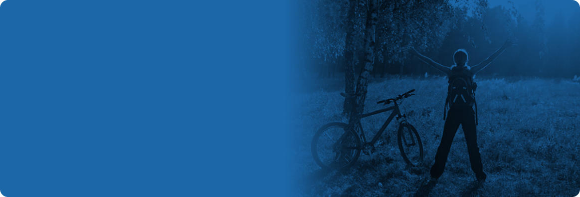 Image of man riding a bike